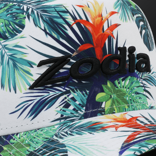 Botanical Mesh Cap featuring vibrant botanical patterns and Zodia logo, perfect for summer. Color: white with floral design.