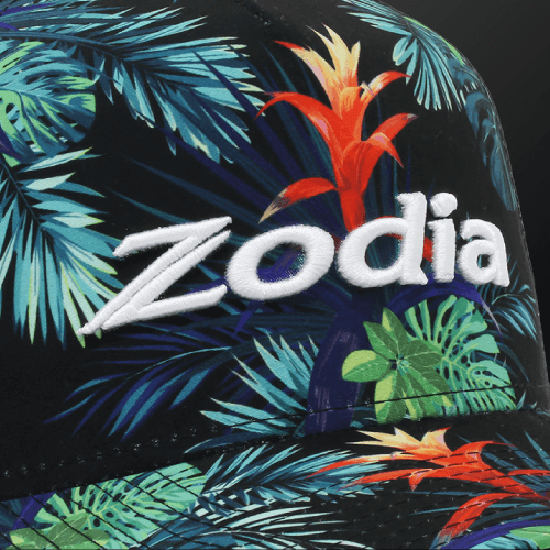 Botanical Mesh Cap featuring vibrant tropical plant pattern and Zodia logo for stylish summer wear.