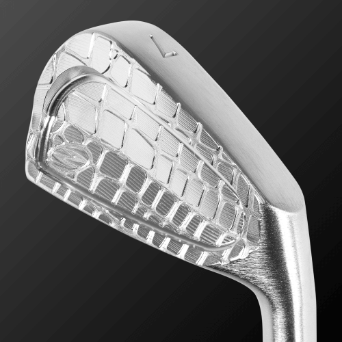 Close-up of Caiman IV CB golf club head showcasing intricate design and craftsmanship.