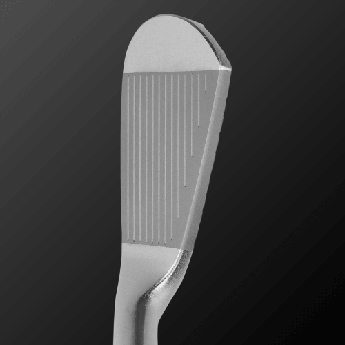 Close-up of the Caiman IV MB golf club head showcasing its polished finish and precision design features.