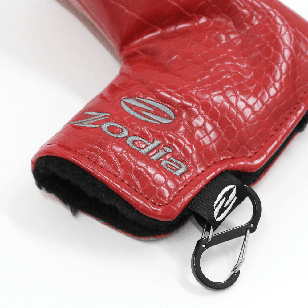 Caiman Pattern Putter Cover (Wide Type) in red leather with Zodia branding and clip for secure storage.