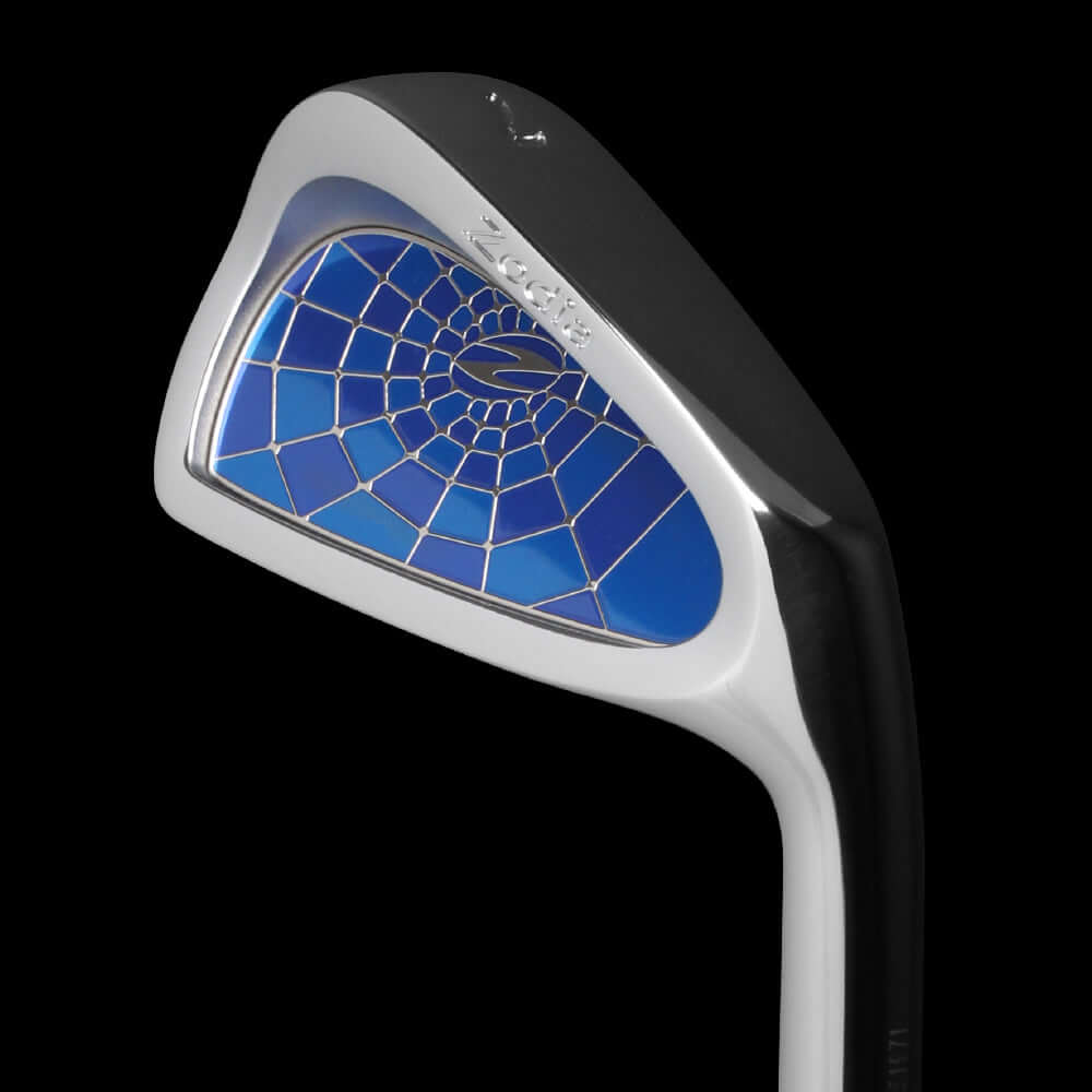 Cavity Badge Chrome golf club with blue spider design and sleek chrome finish for improved distance and forgiveness.