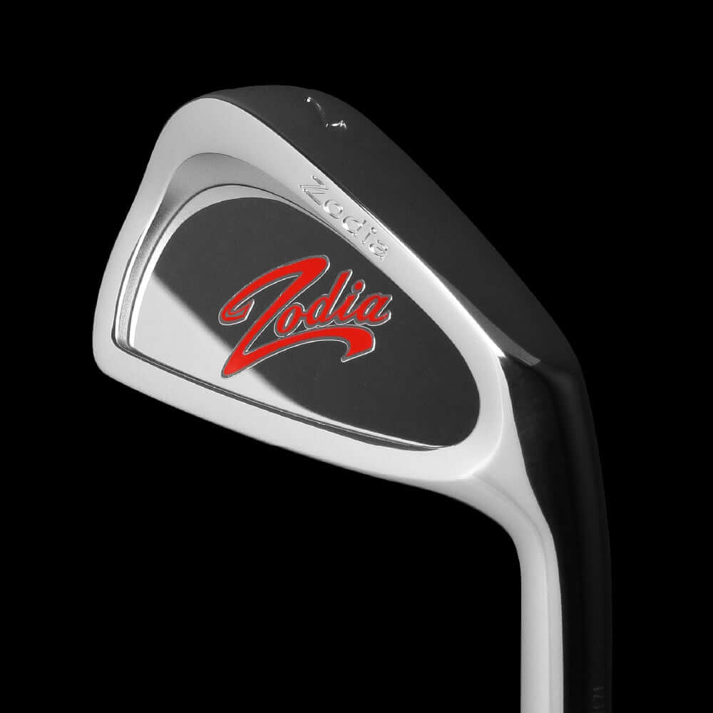 Cavity Badge Chrome golf club from Zodia, featuring a striking red logo on a sleek chrome finish.