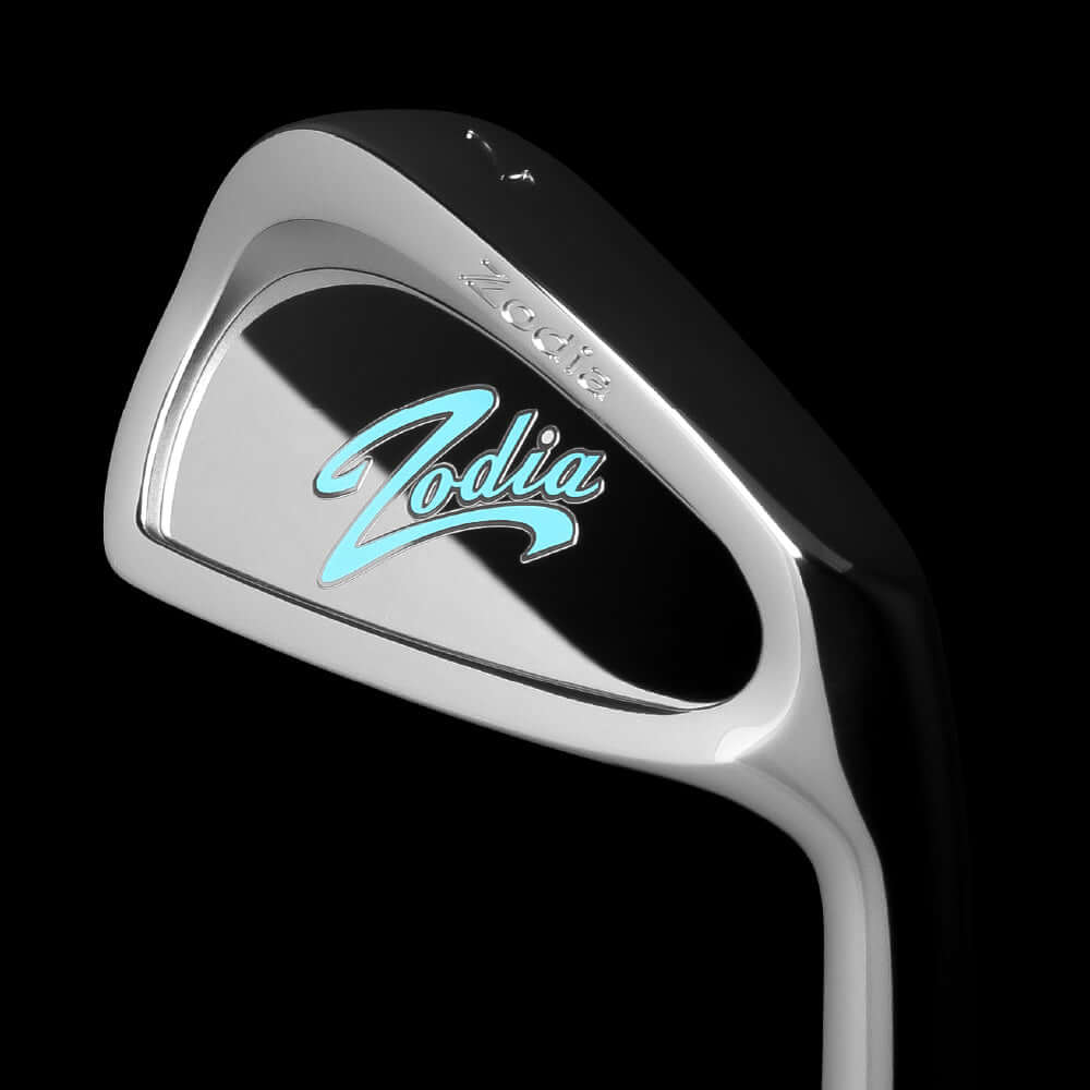 Cavity Badge Chrome golf club image with Zodia branding and shiny chrome finish, highlighting blue logo on the face.