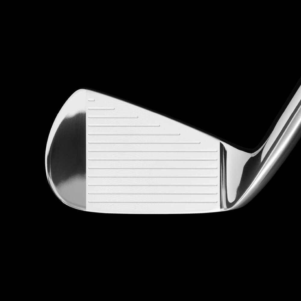 Cavity Badge Chrome golf club face showing sharp face shape and milled design for enhanced performance.