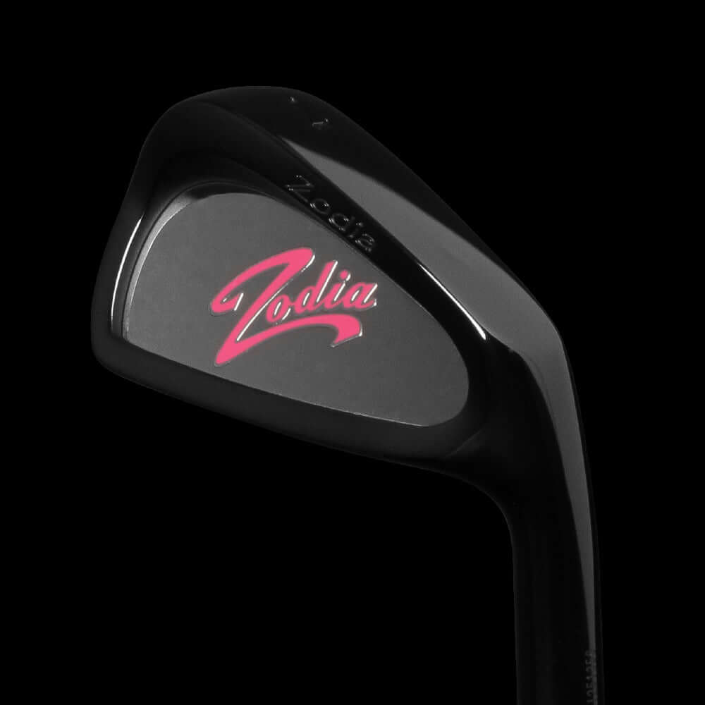 Cavity Badge DLC Black golf club featuring a lightweight model with pink Zodia logo and sleek black design.