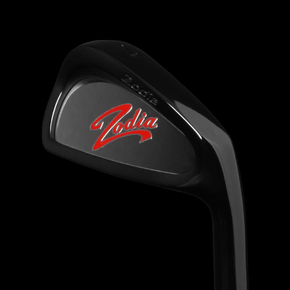 Cavity Badge DLC Black golf club featuring Zodia logo and sleek black design.