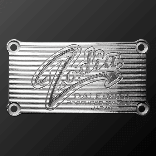 DALE MINI PUTTER CRANK plate featuring Codia logo, manufactured in Japan, showcasing its distinctive silver design.