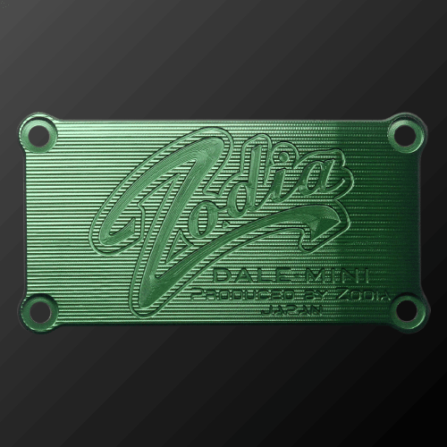 DALE MINI PUTTER CRANK custom engraving plate in green with Zodia branding and product details.