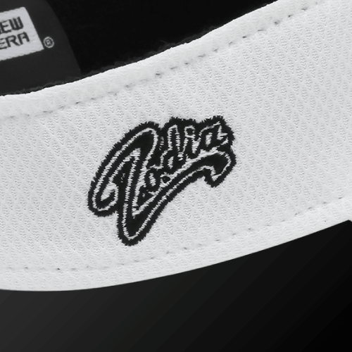 Close-up of the Zodia logo on the Diamond Era Sun Visor, showcasing its stylish design and texture.