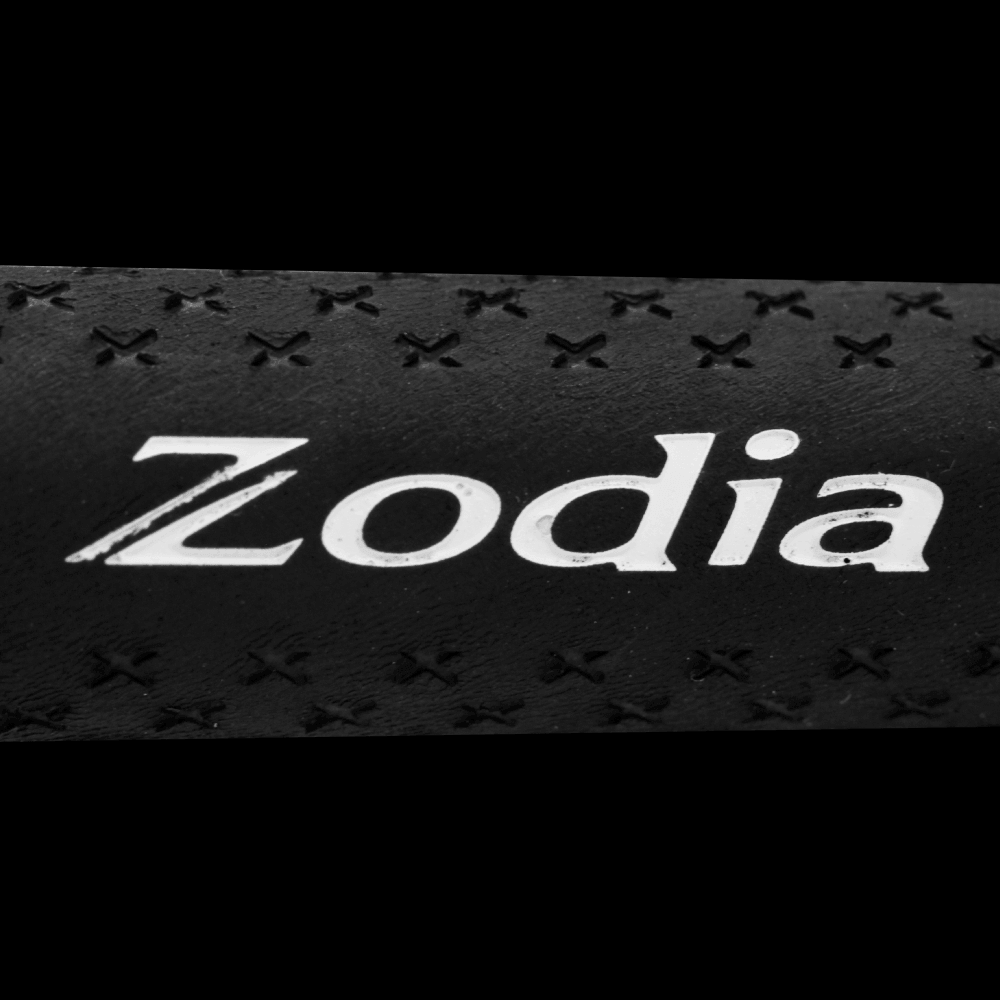 Close-up of the Elite Lucky Star Grip Zodia Logo on a black rubber grip with textured pattern.