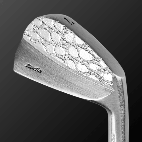 Half Crocodile golf club head showcasing its elegant design and muscle back construction.