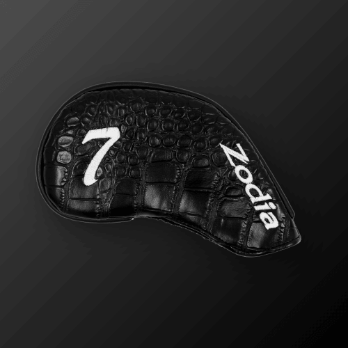 Iron cover with crocodile pattern and white lettering, designed for easy wearing and head protection.