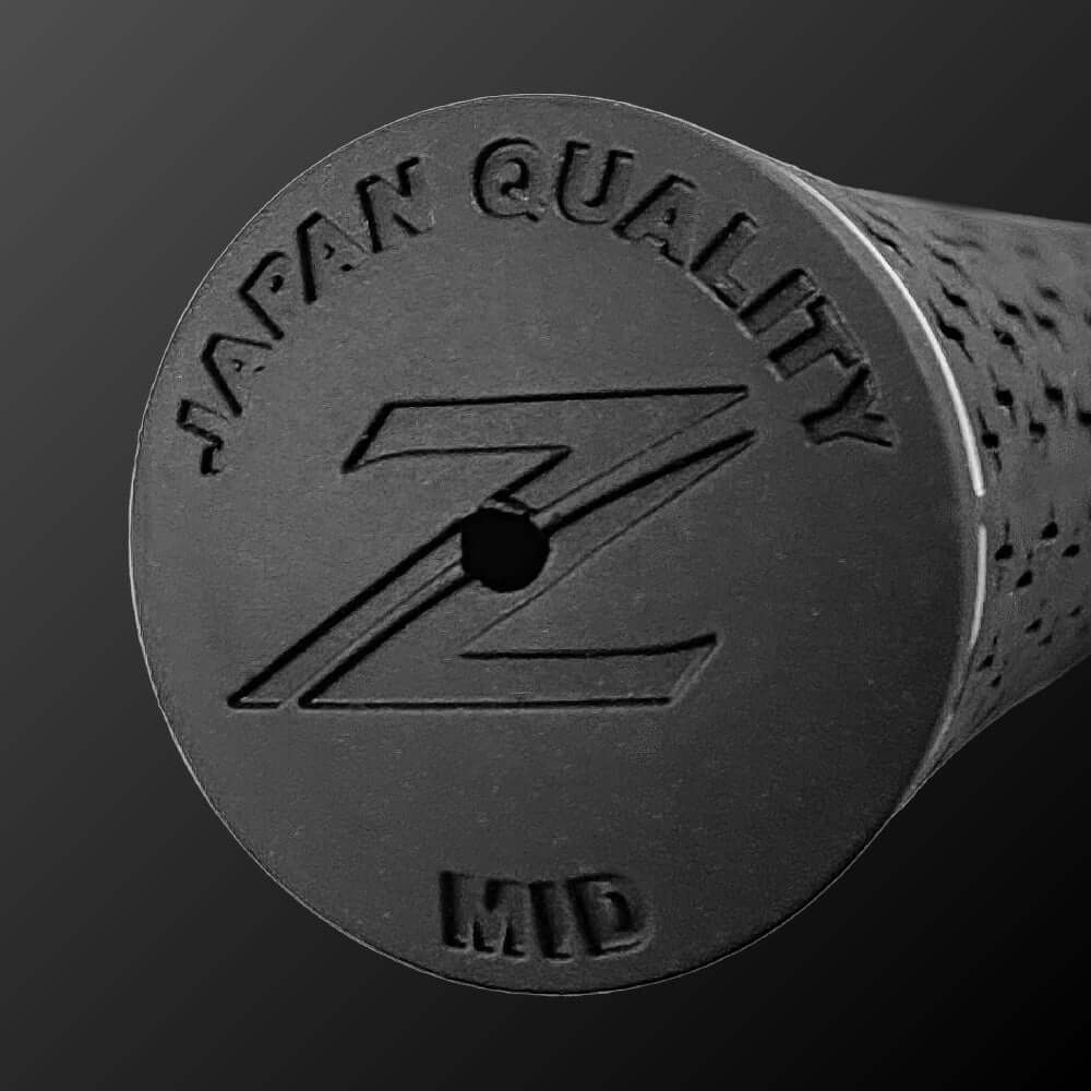 Close-up of Silky Rubber Grip with Japan Quality and MID label, highlighting unique groove pattern.