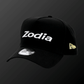 Metal Badge Cap featuring Zodia logo and NEW ERA flag in metal badge on a black cap.