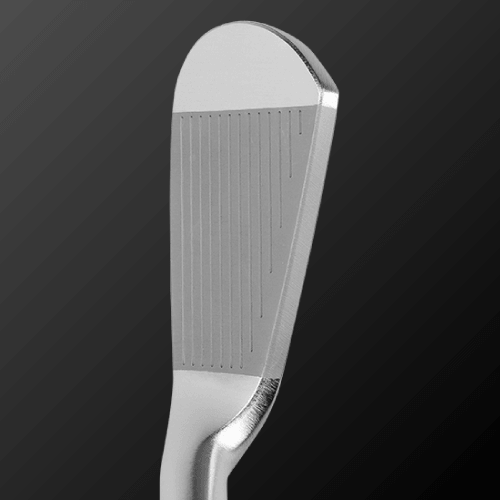 The Origin muscle-back iron club face showcasing precision groove design for competitive golfers.