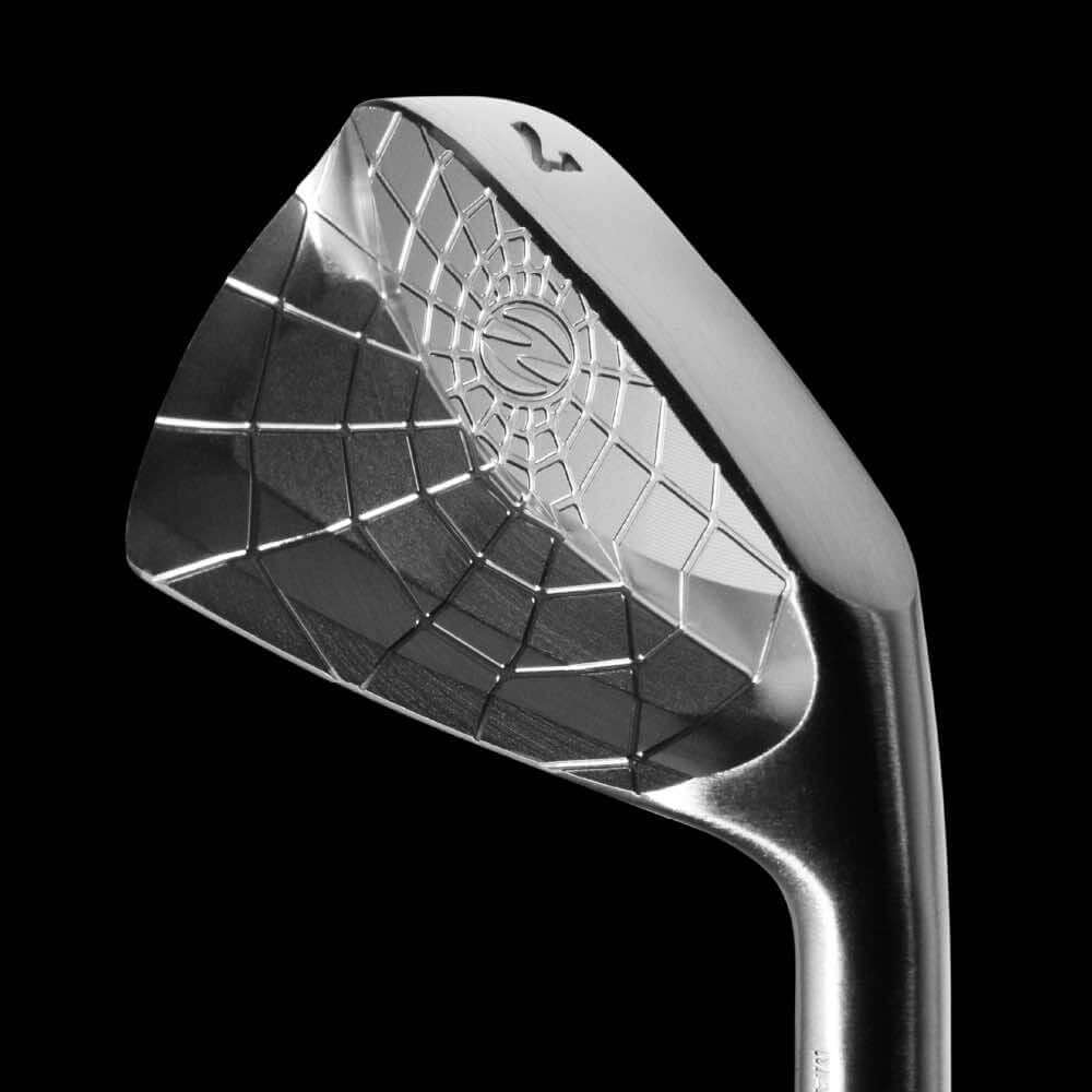 Spider CB iron with a unique spiderweb design showcasing premium craftsmanship and exceptional forgiveness.