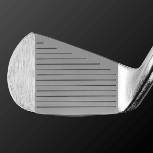 Close-up of The Origin muscle-back iron clubface showcasing precision grooves for optimal ball control.