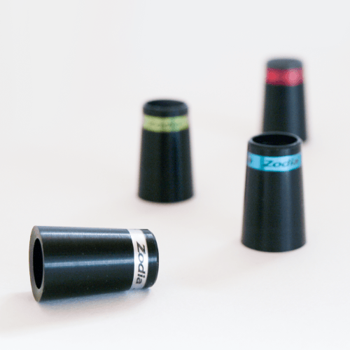 Zodia Color Ferrule in various colors including red, blue, and green with black ferrule featuring Zodia logo.