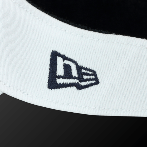 Zodia × NEW ERA Sun Visor showing the logo detail on a classic white cotton visor.