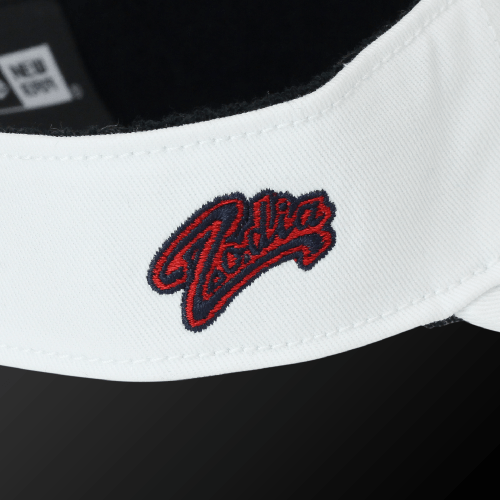 Zodia × NEW ERA Sun Visor featuring an embroidered logo on a classic white fabric.