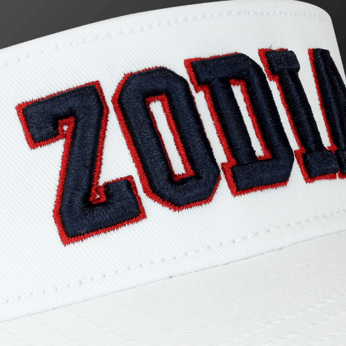 Zodia × NEW ERA Sun Visor featuring bold embroidered logo on classic white fabric.
