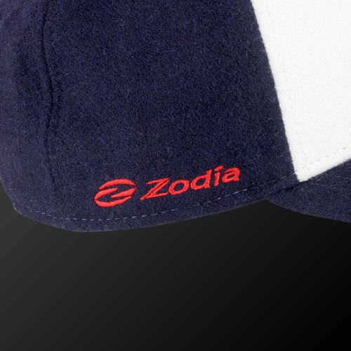 Zodia × NEW ERA Wool Cap showcasing the embroidered logo in red on navy wool fabric.