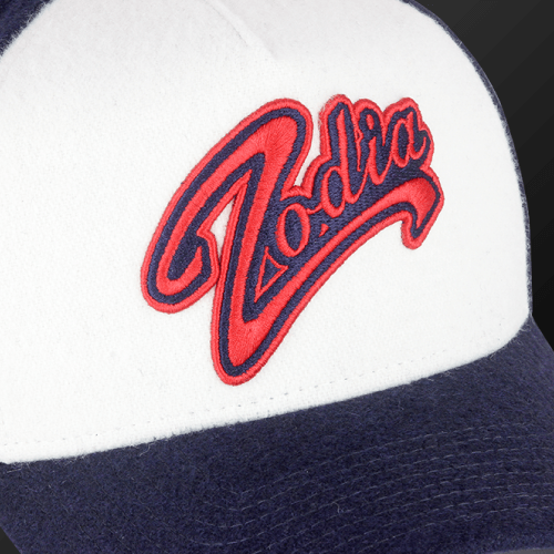 Zodia × NEW ERA Wool Cap featuring embroidered logo on a navy and white cap, perfect for autumn and winter.